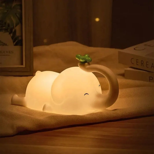 Cute Evan the Elephant children's night light from Sleepypals collection, featuring adjustable brightness and squishy silicone body, ideal for kids' bedroom decor and safe nighttime comfort, by The BlueFox Shop